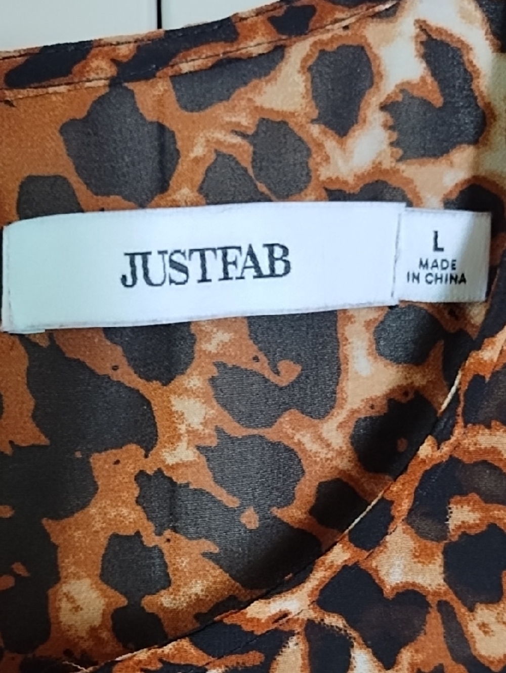 JustFab Leopard Print Top in Brown and Black - Picture 3 of 6
